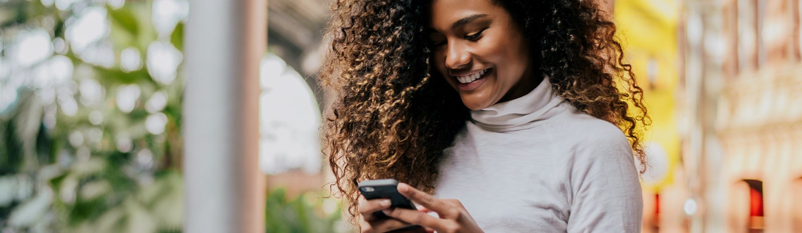 Young woman using mobile phone