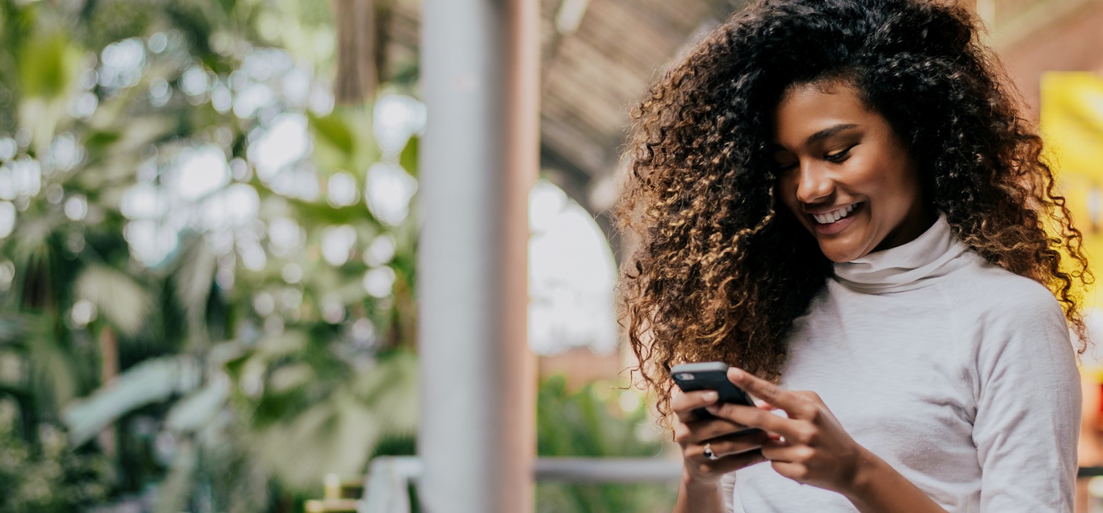 Young woman using mobile phone